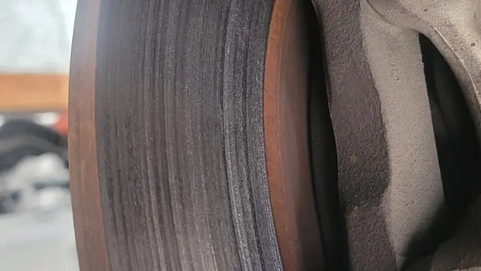 Deeply grooved rear brake rotor on a 2015 Acura MDX
