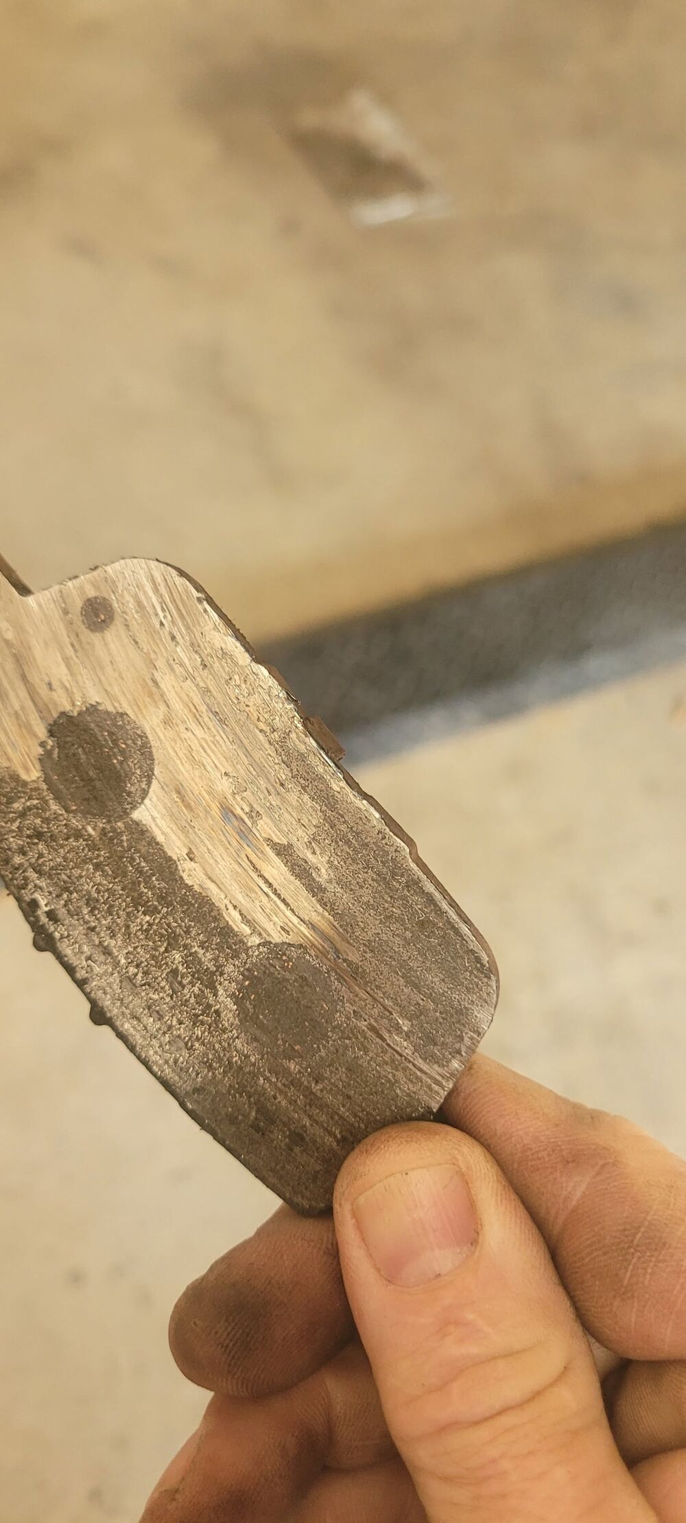 Worn rear pad down to the backing plate